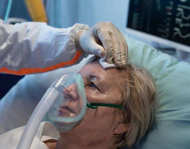 covid_patient_with_oxygen_mask.jpg
