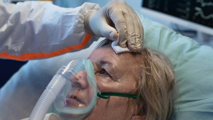 covid_patient_with_oxygen_mask.jpg