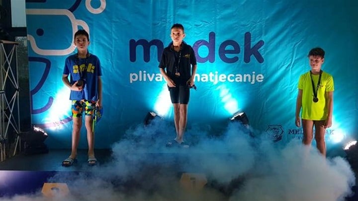 SPORT 5.3._PLIVANJE Toto Šipek-Glavač na najvišoj stepenici postolja.jpg