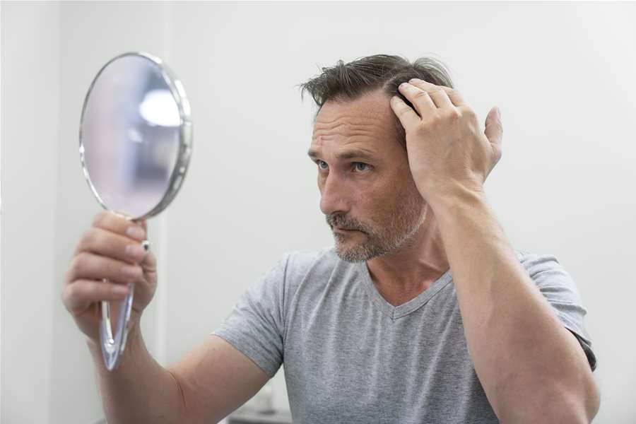 man-getting-hair-loss-treatment.jpg