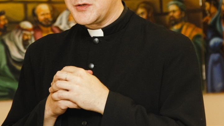 web3-priest-collar-catholic-hands-shutterstock (1).jpg