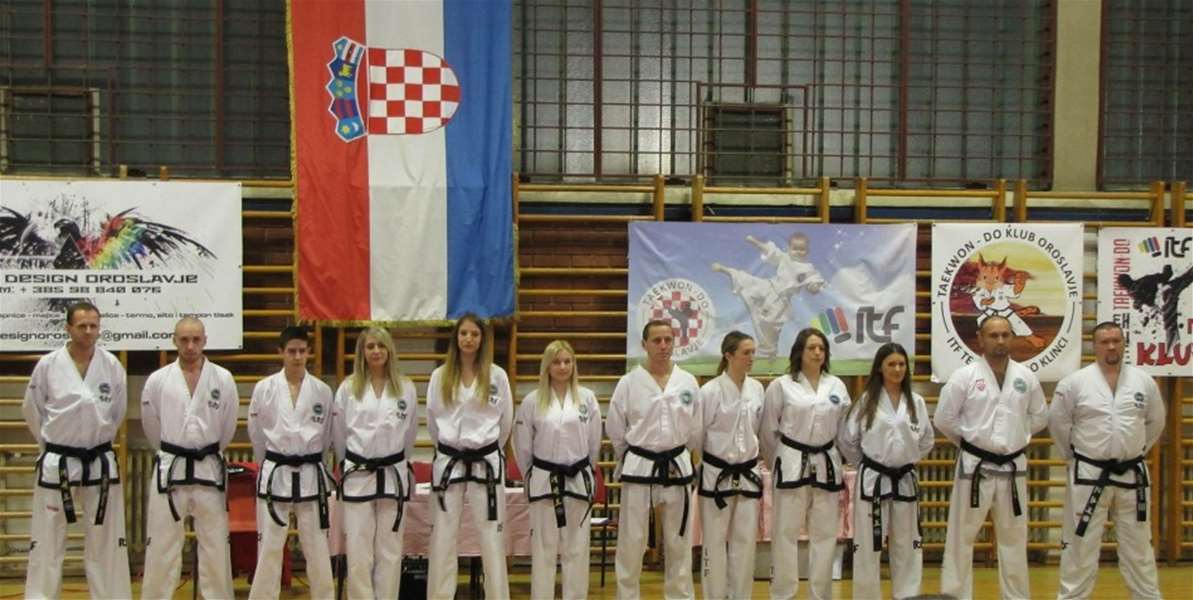 SPORT 17.6._TAEKWONDO Članovi kluba s crnim pojasevima.JPG
