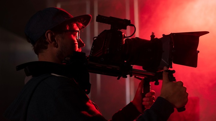 man-filming-with-professional-camera-1.jpg