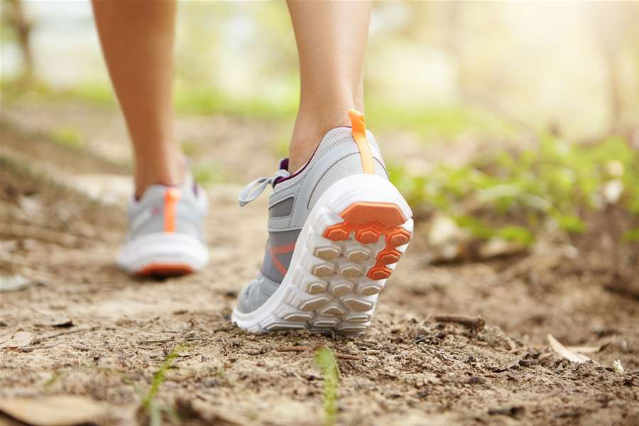 rear-cropped-shot-athletic-legs-woman-jogger-wearing-pink-running-shoes-during-jogging-exercise-outdoors.jpg