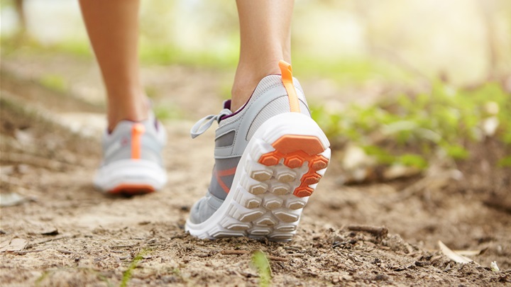 rear-cropped-shot-athletic-legs-woman-jogger-wearing-pink-running-shoes-during-jogging-exercise-outdoors.jpg